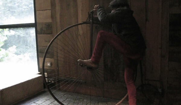 Samson Kambalu, 1876 (On the Penny Farthing), video Still, 2012