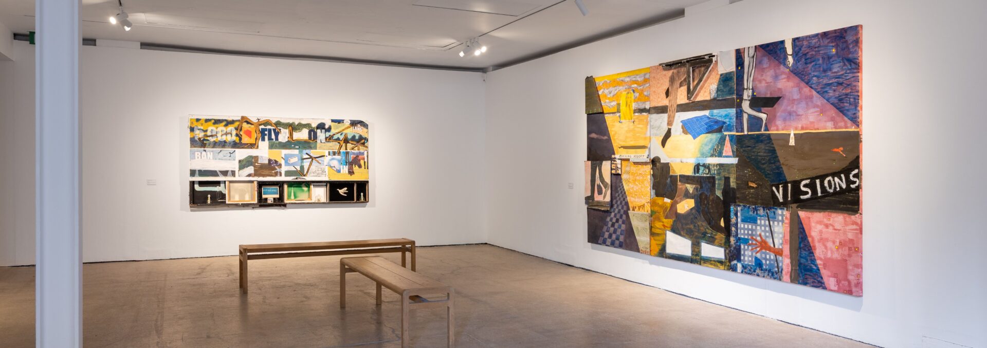 Interior of Castlefield Gallery, white walls and concrete floors. featuring collage artwork by Joe O'Rourke.