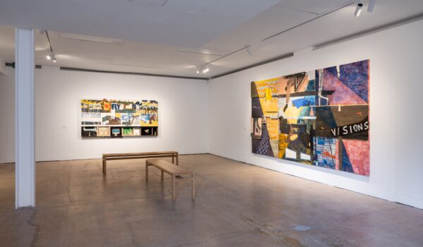 Interior of Castlefield Gallery, white walls and concrete floors. featuring collage artwork by Joe O'Rourke.