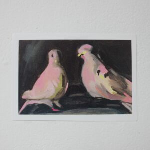 Postcard with design of two pigeons against black background.