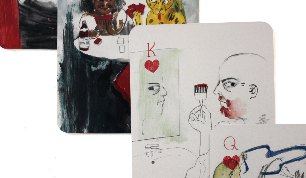 Close up of playing cards showing design details.